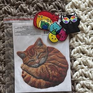 Red and Yellow Cat-Themed Accessories
